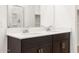 Modern bathroom featuring a double vanity with sleek countertops and a glass-enclosed shower at 3557 E Audrey Dr, San Tan Valley, AZ 85143