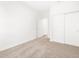 Bedroom with carpeted flooring, closet and white walls, offering a cozy and inviting atmosphere at 3557 E Audrey Dr, San Tan Valley, AZ 85143