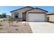 Charming single-story home featuring a neutral color palette, two-car garage, and low-maintenance landscaping at 3557 E Audrey Dr, San Tan Valley, AZ 85143