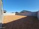 Large backyard enclosed by block wall, perfect for creating a private and personalized outdoor space at 3660 E Audrey Dr, San Tan Valley, AZ 85143