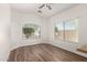 Cozy dining area offers natural light and durable wood-look flooring, perfect for Gathering meals at 41598 N Ranch Dr, San Tan Valley, AZ 85140