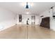 Spacious garage with epoxy flooring, storage cabinets, and a clean, organized layout at 41598 N Ranch Dr, San Tan Valley, AZ 85140