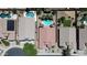 Aerial view of community with multiple pools and homes at 41847 W Sparks Ct, Maricopa, AZ 85138