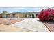Charming single-story home with well-maintained landscaping and a spacious driveway at 4307 E Walatowa St, Phoenix, AZ 85044