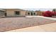 Charming single-story home with well-maintained landscaping and a spacious driveway at 4307 E Walatowa St, Phoenix, AZ 85044