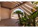 View of archway entrance leading to the home's exterior and desert landscape at 4527 E Sunrise Dr, Phoenix, AZ 85044