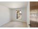 Neutral bedroom with a window overlooking the backyard at 4535 E Redfield Rd, Phoenix, AZ 85032