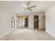 Bedroom features access to the yard and an attached closet at 4535 E Redfield Rd, Phoenix, AZ 85032