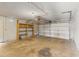 Spacious garage featuring built-in shelving for optimal organization and storage at 4535 E Redfield Rd, Phoenix, AZ 85032