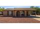 Charming single-story home with arched entryway and desert landscaping for low maintenance at 4624 S Fair Ln, Tempe, AZ 85282