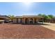 Lovely single-story home with extended carport and desert rock landscaping at 4624 S Fair Ln, Tempe, AZ 85282