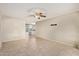 Living room with tile flooring, neutral paint, and ceiling fan at 4624 S Fair Ln, Tempe, AZ 85282