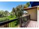 Balcony view overlooking lush greenery and a manicured yard at 4812 E Winston Dr # 2, Phoenix, AZ 85044