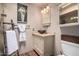 Stylish bathroom featuring a unique bowl sink and decorative ladder at 4812 E Winston Dr # 2, Phoenix, AZ 85044