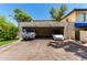 Spacious two-car carport providing covered parking, protection from the elements at 4812 E Winston Dr # 2, Phoenix, AZ 85044