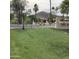 Community green space, landscaping, and mountain views creating a beautiful environment at 4812 E Winston Dr # 2, Phoenix, AZ 85044