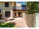Inviting home featuring a private balcony, desert landscaping, and a charming architectural style at 4812 E Winston Dr # 2, Phoenix, AZ 85044