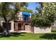 Charming two-story home with a balcony and a well-manicured lawn and beautiful, mature landscaping at 4812 E Winston Dr # 2, Phoenix, AZ 85044