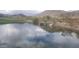 Scenic desert golf course features a pond with ducks and views of the mountains at 4812 E Winston Dr # 2, Phoenix, AZ 85044