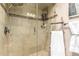 Modern shower featuring tile walls and a glass door at 4812 E Winston Dr # 2, Phoenix, AZ 85044