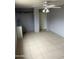 Bedroom featuring tile flooring, ceiling fan, and closet at 527 S Macdonald --, Mesa, AZ 85210