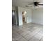 Living room view into kitchen, showcasing tile flooring at 527 S Macdonald --, Mesa, AZ 85210