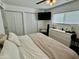 Bright bedroom offers ample closet space and a ceiling fan at 538 E Glade Ave, Mesa, AZ 85204