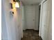 Hallway showing access to rooms and closet space at 538 E Glade Ave, Mesa, AZ 85204