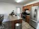 Modern kitchen featuring stainless steel appliances and ample counter space at 538 E Glade Ave, Mesa, AZ 85204