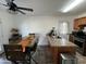 Cozy kitchen features modern appliances and a breakfast bar overlooking the dining area at 538 E Glade Ave, Mesa, AZ 85204