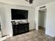 Inviting living room with tile floors, a fireplace, and lots of light at 538 E Glade Ave, Mesa, AZ 85204