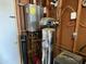 Utility room with water heater and water softener at 538 E Glade Ave, Mesa, AZ 85204