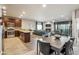 Open-concept living space showcasing a dining area, kitchen, and living room with fireplace at 6145 E Cave Creek Rd # 203, Cave Creek, AZ 85331