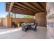 Exterior patio with beautiful outdoor furniture, stone and stucco at 6145 E Cave Creek Rd # 203, Cave Creek, AZ 85331