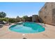 Large pool and hot tub with poolside chairs, lounge, and tables at 6145 E Cave Creek Rd # 203, Cave Creek, AZ 85331