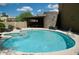 View of a large swimming pool and hot tub with lounge chairs and furniture at 6145 E Cave Creek Rd # 203, Cave Creek, AZ 85331