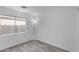 Vacant bedroom with carpet and a window to provide natural light at 6410 W Winslow Ave, Phoenix, AZ 85043