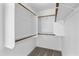 Spacious walk-in closet with built-in shelving and ample hanging space for optimal organization at 6410 W Winslow Ave, Phoenix, AZ 85043