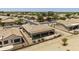 An aerial perspective, highlighting homes in a desert community with well-manicured surroundings at 6811 S Four Peaks Way, Chandler, AZ 85249