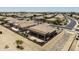 An elevated view featuring a home with a covered patio and well-kept desert landscaping at 6811 S Four Peaks Way, Chandler, AZ 85249