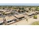 An aerial view capturing the layout of neighborhood with well-maintained landscapes and roads at 6811 S Four Peaks Way, Chandler, AZ 85249