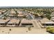 Community aerial shot, displaying the neat arrangement of homes and desert landscaping at 6811 S Four Peaks Way, Chandler, AZ 85249