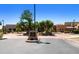 Inviting community center entrance features desert landscaping, creating a welcoming space for residents and visitors alike at 6811 S Four Peaks Way, Chandler, AZ 85249