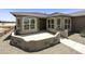 Charming front patio and walkway leading to the front door of this desert home at 6811 S Four Peaks Way, Chandler, AZ 85249