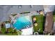 Aerial view of a backyard featuring a pool, spa, and lounge areas at 7508 N 13Th Ave, Phoenix, AZ 85021