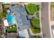 Aerial view of house featuring a backyard pool, hot tub, and landscaping at 7508 N 13Th Ave, Phoenix, AZ 85021