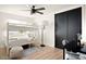 Functional bedroom features a bunk bed, workspace, and modern design, maximizing space and style for a comfortable living area at 7508 N 13Th Ave, Phoenix, AZ 85021