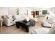 Spacious living room featuring modern furnishings, hardwood floors, and ample natural light at 7508 N 13Th Ave, Phoenix, AZ 85021