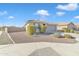 Attractive single-story home with drought-tolerant landscaping and a two-car garage at 7580 W Darrel Rd, Laveen, AZ 85339