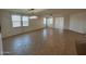 Large living room with tile floors, ceiling fan and recessed lighting at 7580 W Darrel Rd, Laveen, AZ 85339